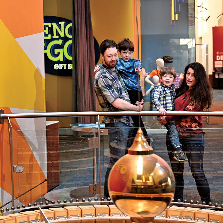 Watch the giant pendulum in the atrium prove Earth’s rotation.